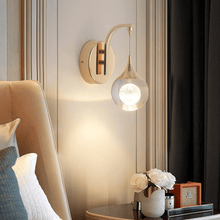 Load image into Gallery viewer, Floating Moon Wall Light on bedroom wall above bedside table