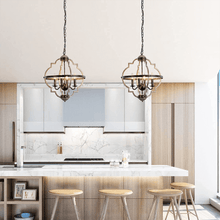 Load image into Gallery viewer, Two Industrial Metal Farmhouse Chandeliers hanging above white marble kitchen island