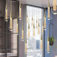 Load image into Gallery viewer, Glass Teardrop Pendant Lights hanging from ceiling