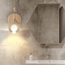 Load image into Gallery viewer, Floating Moon Wall Light on bathroom wall next to mirror