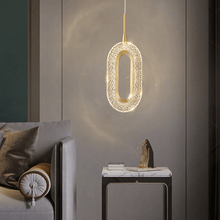 Load image into Gallery viewer, Diamond Style Pendant Light model B next to living room sofa