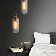 Load image into Gallery viewer, Smoky Glass Pendant Lights above bedside table