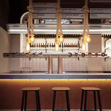 Load image into Gallery viewer, Hemp Rope Attic Light in above drinks bar in restaurant