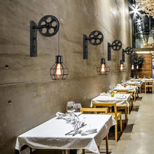 Load image into Gallery viewer, Vintage Rusted Wall Lights above restaurant dining tables