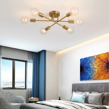 Load image into Gallery viewer, Modern Exposed Chandelier above bed in bedroom