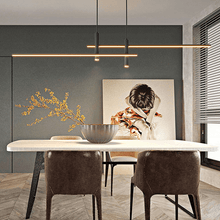 Load image into Gallery viewer, Black Modern Dining Room Chandelier hanging above white table and brown leather chairs
