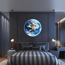 Load image into Gallery viewer, Earth Planet Wall Light above bed on bedroom wall
