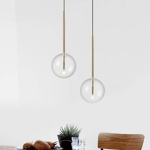 Nordic Glass Pendant Lights hanging from ceiling