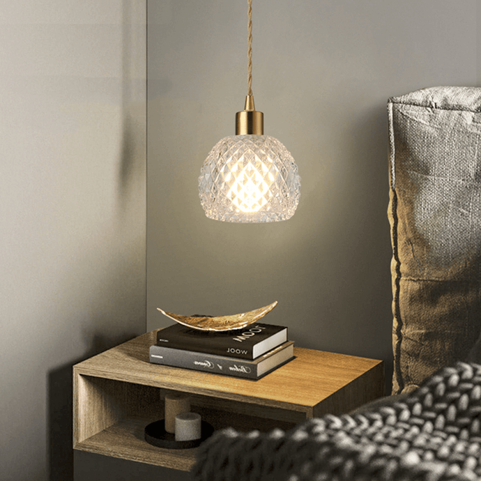 Crystal Pendant Lamp above bedside table next to bed