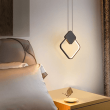 Load image into Gallery viewer, Black LED Full Crown Square Pendant Light above bedside table
