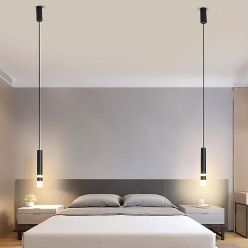 Extended Cable Pendant Lamps above bedside table