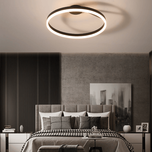 Black Modern Single Arm LED Ring Light above bed in bedroom
