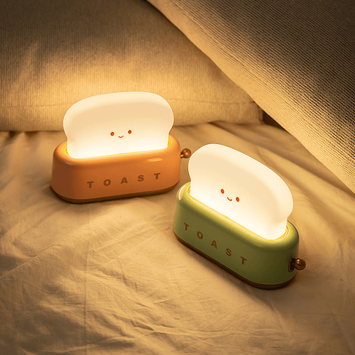 Two Bread Maker LED Night Lights on bed