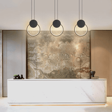 Load image into Gallery viewer, LED Full Crown Circular Pendant Lights above reception desk
