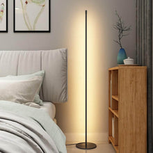 Load image into Gallery viewer, Minimalist LED Floor Lamp next to bed in bedroom
