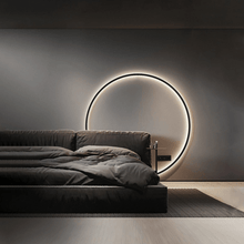 Load image into Gallery viewer, Minimalist LED Ring Light behind bed on bedroom wall
