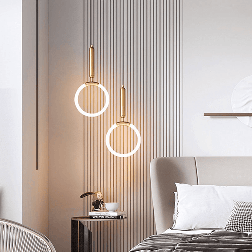 Two Nordic Shaped Pendant Lights above bedside table in bedroom