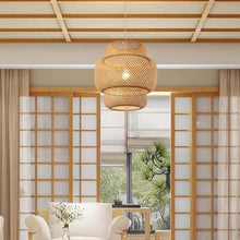 Load image into Gallery viewer, Modern Bamboo Chandelier above sofa in living room
