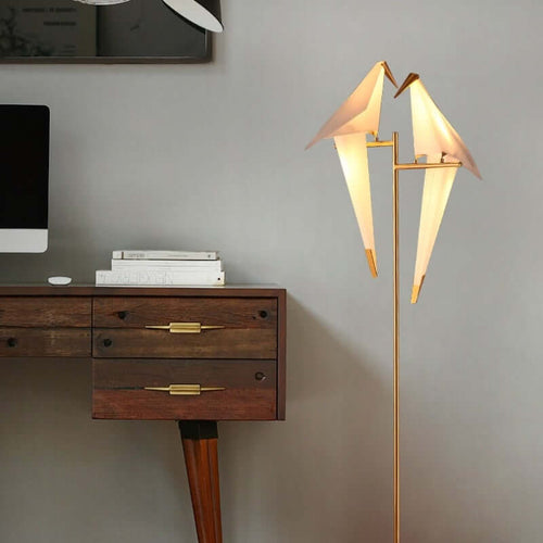 Minimalist Bird Floor Lamp Two Birds model next to desk in living room