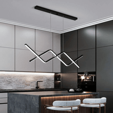 Load image into Gallery viewer, Black Oscillating Strip Chandelier above kitchen island
