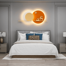 Load image into Gallery viewer, Orange Reindeer Wall Light above bed in bedroom
