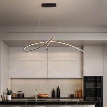 Load image into Gallery viewer, Cavelights Signature Chandelier hanging over kitchen island

