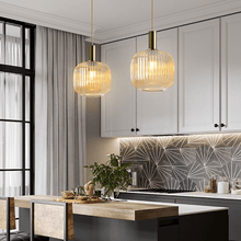 Load image into Gallery viewer, Two Nordic Coloured Glass Pendant Lights in cognac colour above kitchen island
