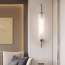 Load image into Gallery viewer, Gold &amp; White Nordic Stylish Wall Lamp on wall above light grey sofa
