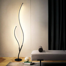Load image into Gallery viewer, Modern Tree Branch Floor Lamp next to bedroom sofa
