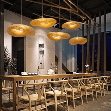 Load image into Gallery viewer, Asian Bamboo Pendant Light above large dining room table
