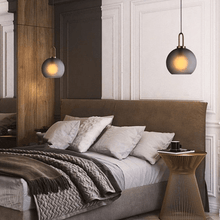 Load image into Gallery viewer, Smoky Glass Pendant Lights above bedside tables either side of bed
