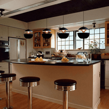 Load image into Gallery viewer, Four black Modern Globe Pendant Lights above kitchen island
