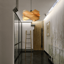 Load image into Gallery viewer, Wood Skin Pendant Light hanging from ceiling in hallway
