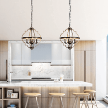 Load image into Gallery viewer, Two Industrial Metal Farmhouse Chandeliers hanging above white marble kitchen island
