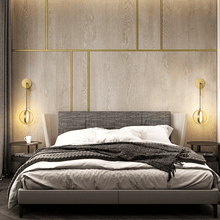 Load image into Gallery viewer, Gold Modern Luxury Ring Wall Lights on bedroom wall either side of bed
