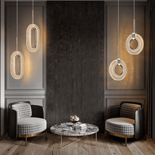 Load image into Gallery viewer, Diamond Style Pendant Lights above living room chairs
