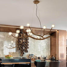 Load image into Gallery viewer, Rustic Tree Branch Pendant Light on ceiling of drinks bar

