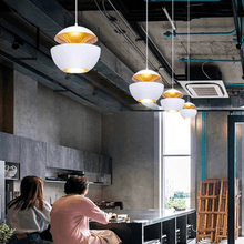 Load image into Gallery viewer, White Modern Globe Pendant Lights above kitchen table
