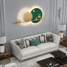 Load image into Gallery viewer, Green Reindeer Wall Light above sofa in living room
