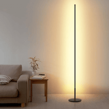 Load image into Gallery viewer, Minimalist LED Floor Lamp next to sofa in living room
