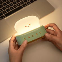 Load image into Gallery viewer, Bread Maker LED Night Light in front of laptop
