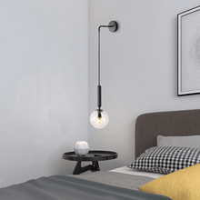 Load image into Gallery viewer, Black Nordic Globe Wall Light above coffee table in bedroom
