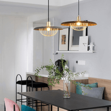 Load image into Gallery viewer, Two Japanese Style Metal Pendant Lights hanging above dining room table
