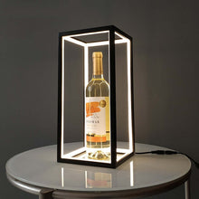 Load image into Gallery viewer, Minimalist Rectangular Cube Light on coffee table with wine bottle inside
