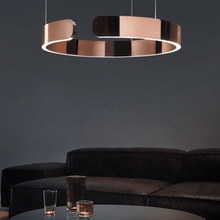 Load image into Gallery viewer, Rose Gold Creative Designer Ring Light above coffee table in living room
