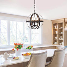 Load image into Gallery viewer, Rustic Globe Chandelier hanging above white dining table in dining room
