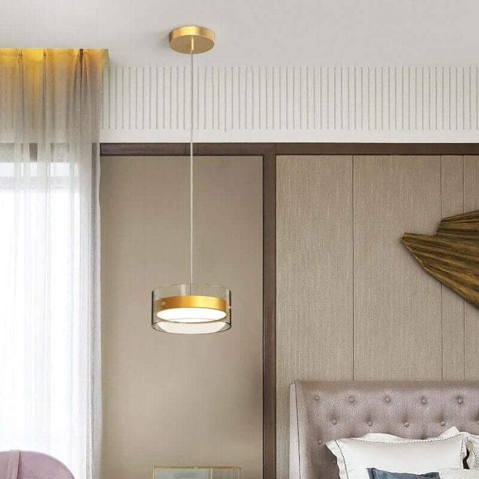 Gold Industrial Style Chandelier next to bed in bedroom