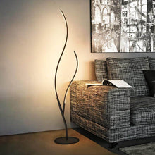 Load image into Gallery viewer, Modern Tree Branch Floor Lamp next to sofa in living room
