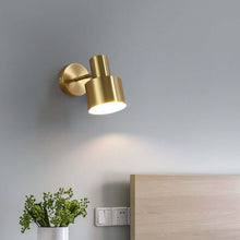Load image into Gallery viewer, Gold Decorative Metal Wall Light above bed headboard in bedroom
