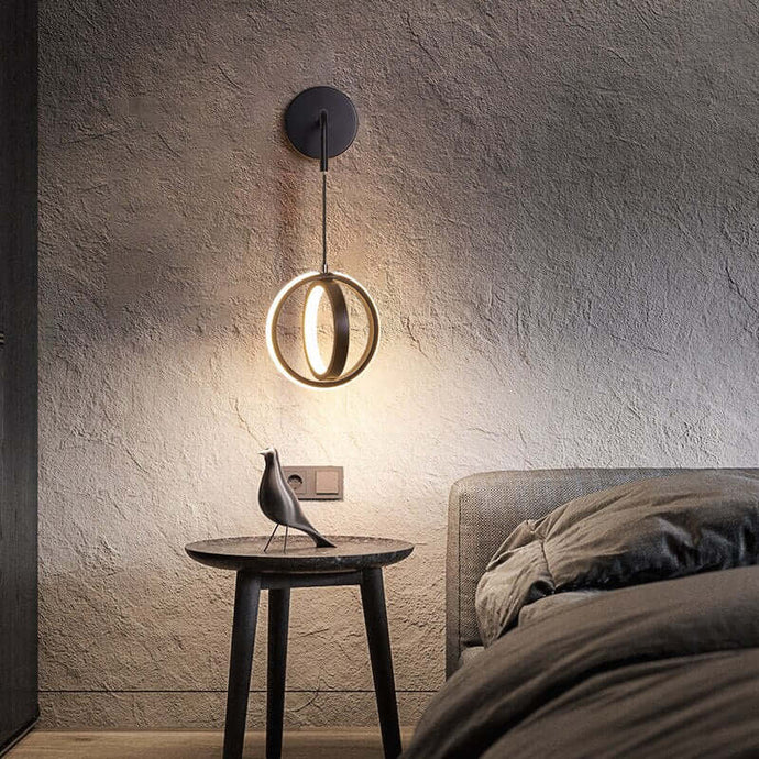 Black Modern Luxury Ring Wall Light above bedside table in bedroom